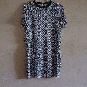 Topshop mini dress with open back. Navy and White madallion design.Size 4 NWOT